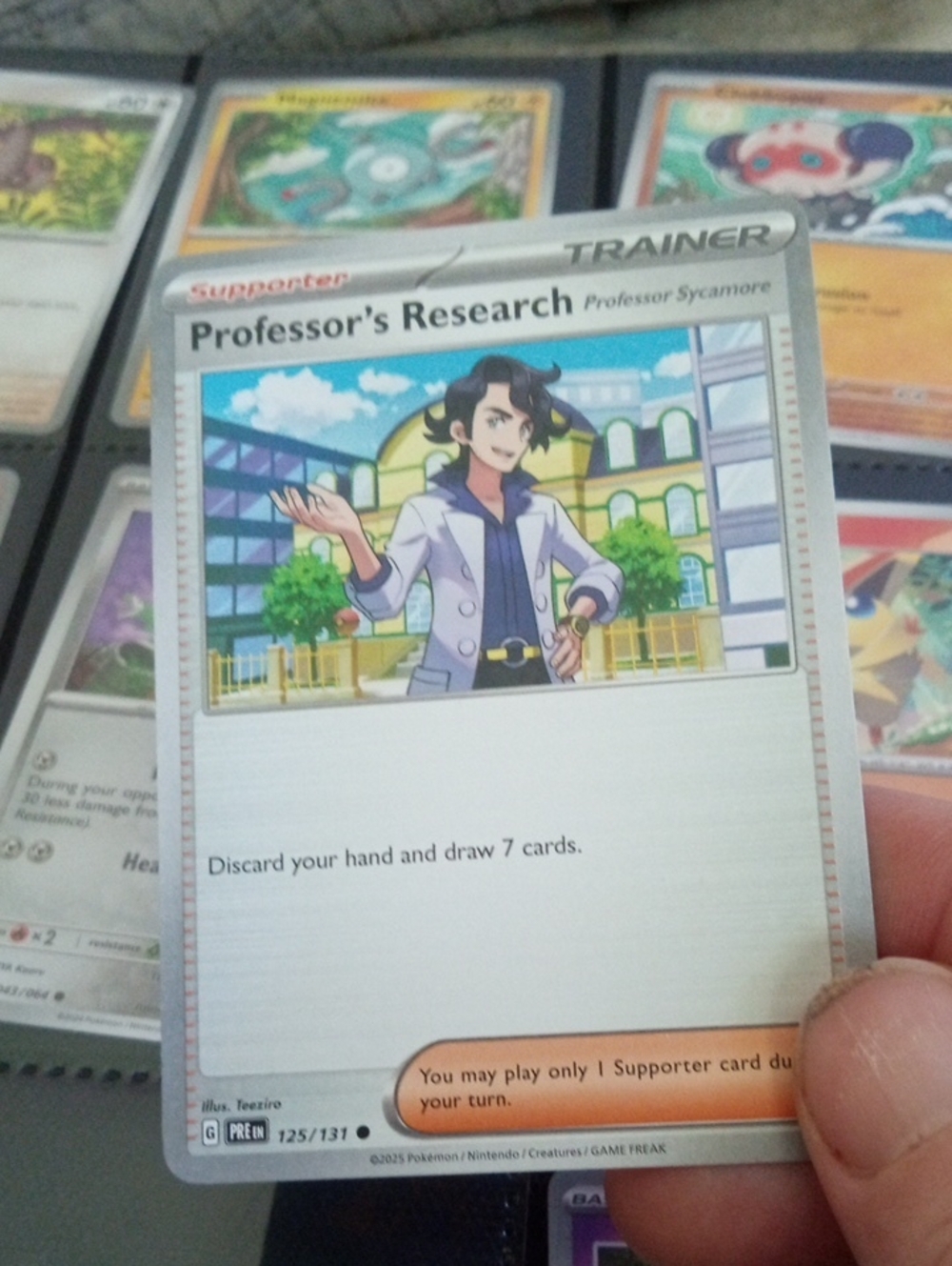 Pokemon Professor's Research Trainer Card — White, Silver, Blue